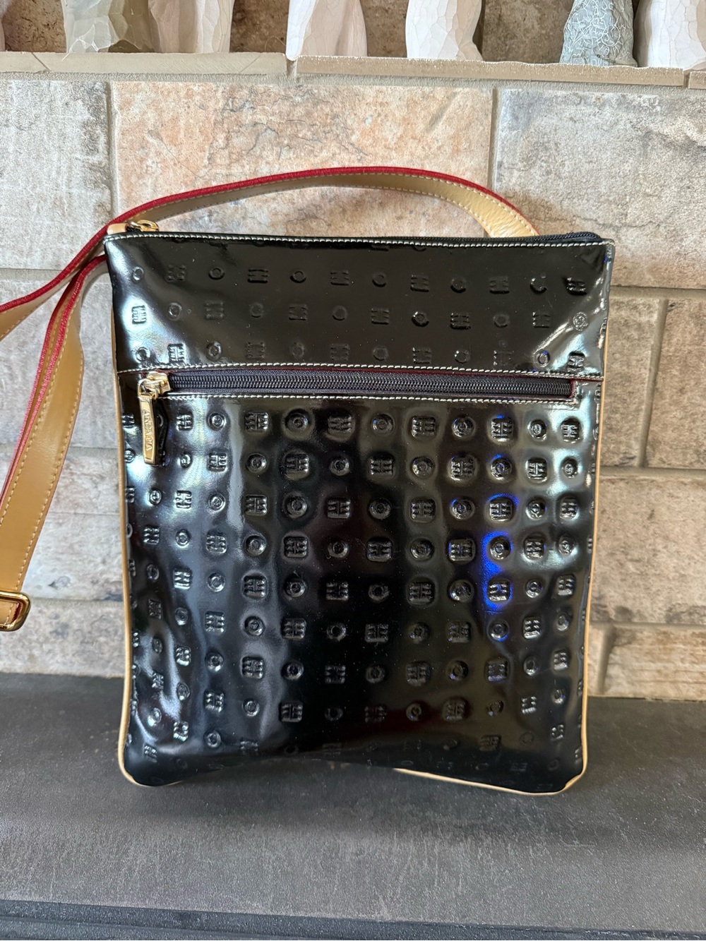Arcadia Patent Leather Slim Crossbody Bag in Black with Tan Strap